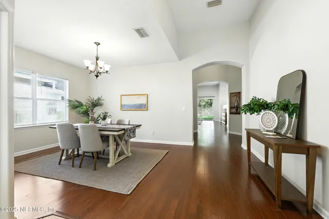 a bed room with a bed and a window