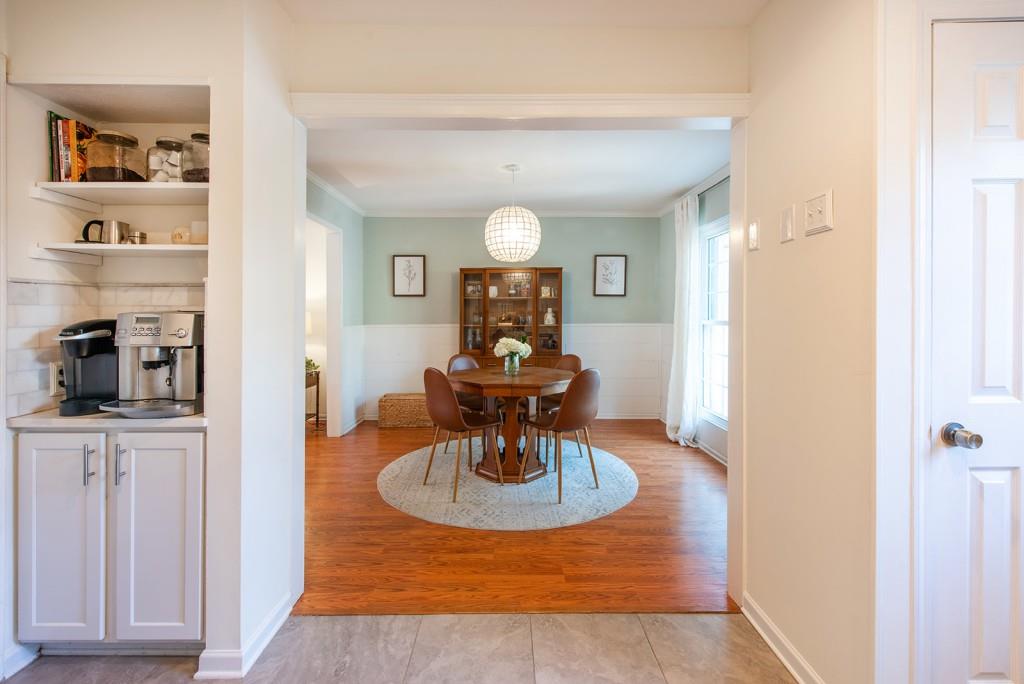 3 Surry County Place Northwest Atlanta, GA 30318 - Photo 14 of 50 a view of a livingroom with furniture wooden floor a chandelier