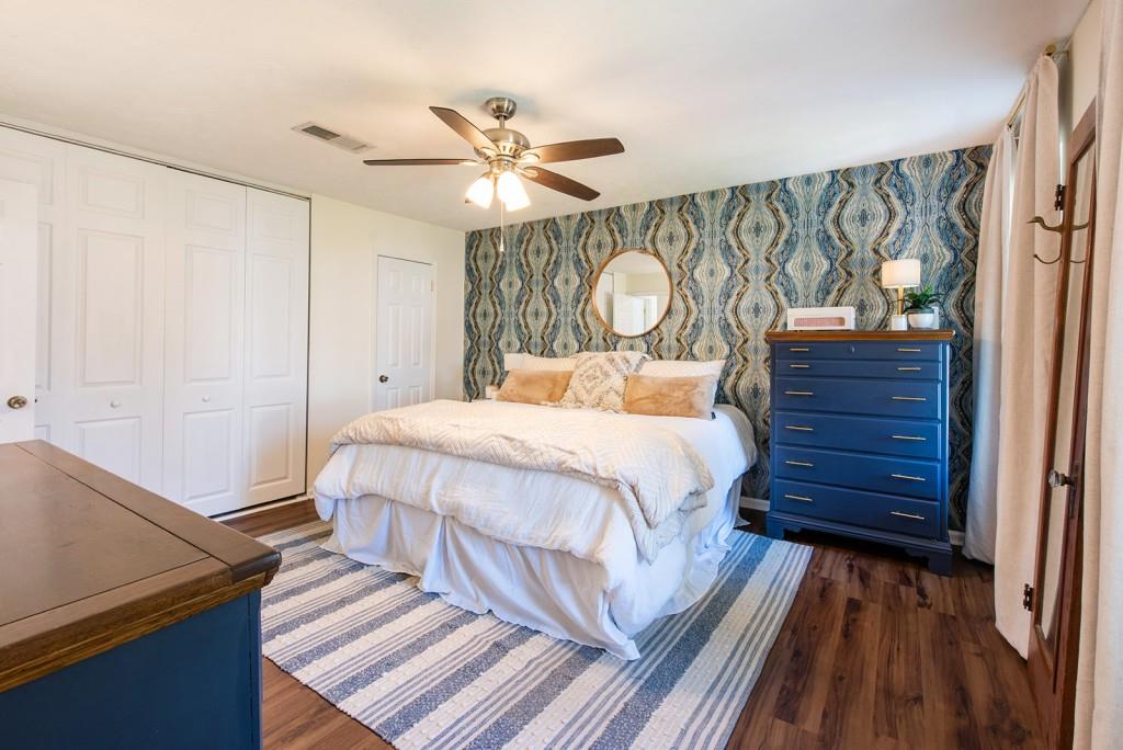 3 Surry County Place Northwest Atlanta, GA 30318 - Photo 20 of 50 a bedroom with a bed and a window