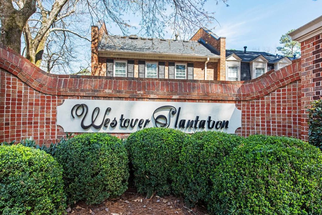 3 Surry County Place Northwest Atlanta, GA 30318 - Photo 40 of 50 a view of a sign board with buildings in the background