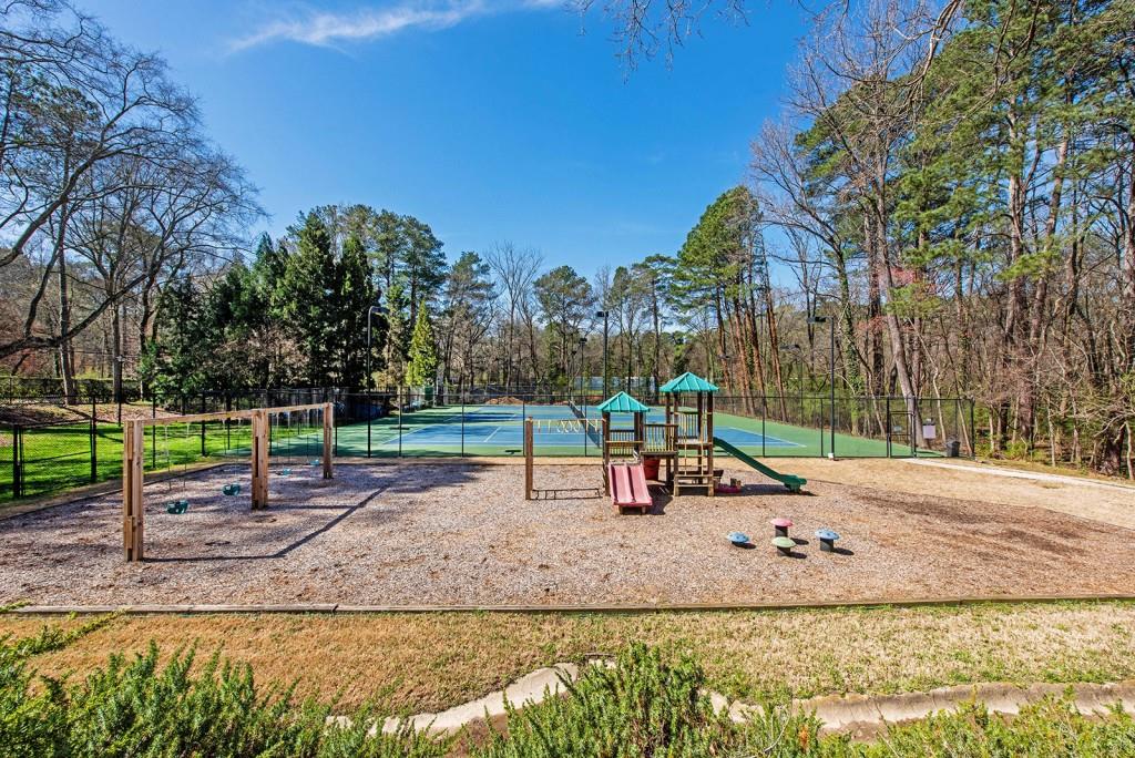 3 Surry County Place Northwest Atlanta, GA 30318 - Photo 42 of 50 a view of a park with swings