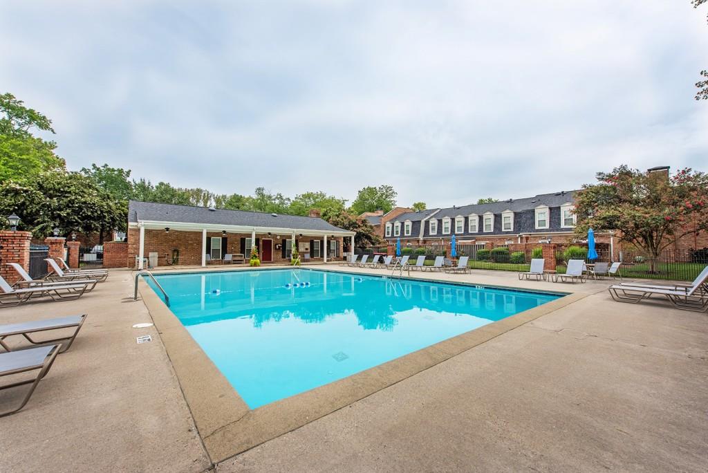 3 Surry County Place Northwest Atlanta, GA 30318 - Photo 47 of 50 a view of a swimming pool with a patio