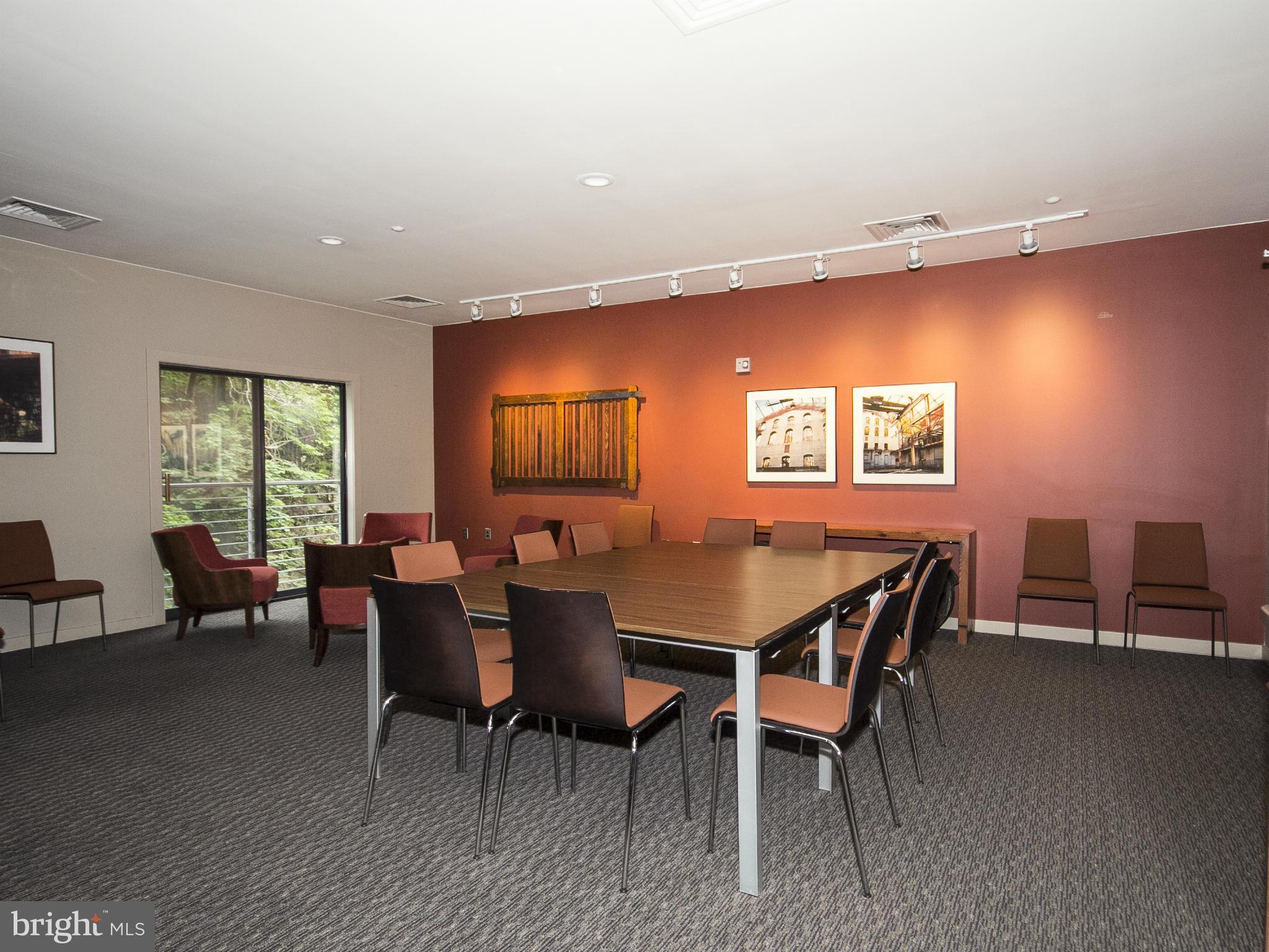 2007 Clipper Park Road, Unit 116 Baltimore, MD 21211 - Photo 16 of 30 a view of a dining room with furniture