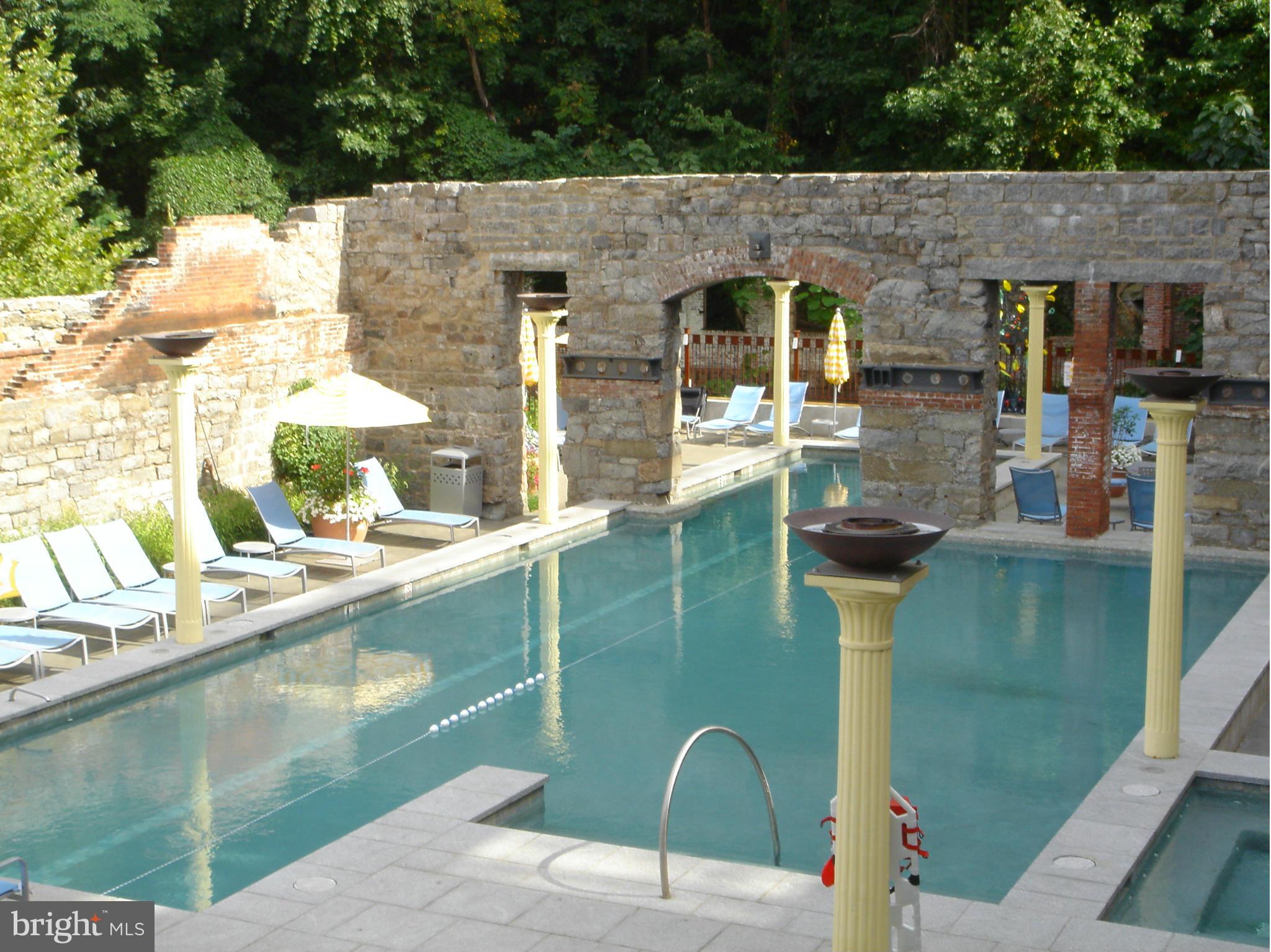 2007 Clipper Park Road, Unit 116 Baltimore, MD 21211 - Photo 24 of 30 a view of pool with outdoor seating