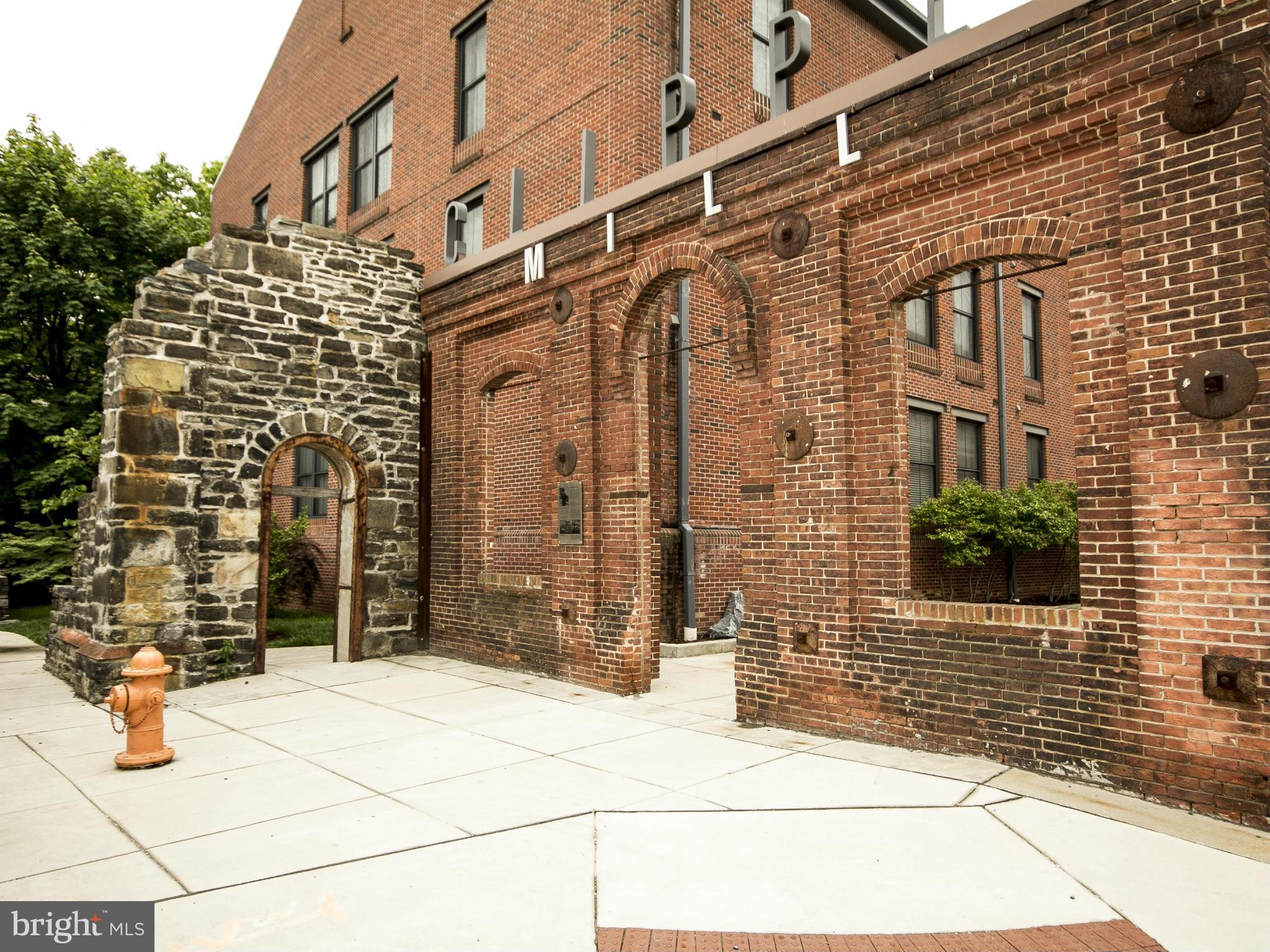 2007 Clipper Park Road, Unit 116 Baltimore, MD 21211 - Photo 25 of 30 a view of a brick building with many windows
