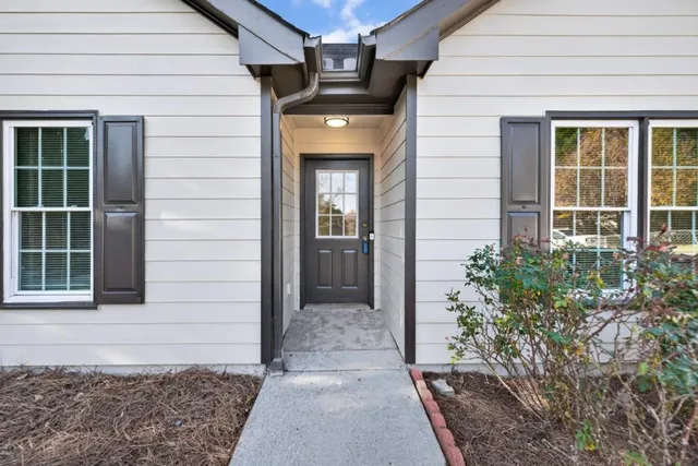 a view of entrance gate of a house
