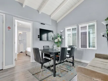 a view of a livingroom with furniture and window