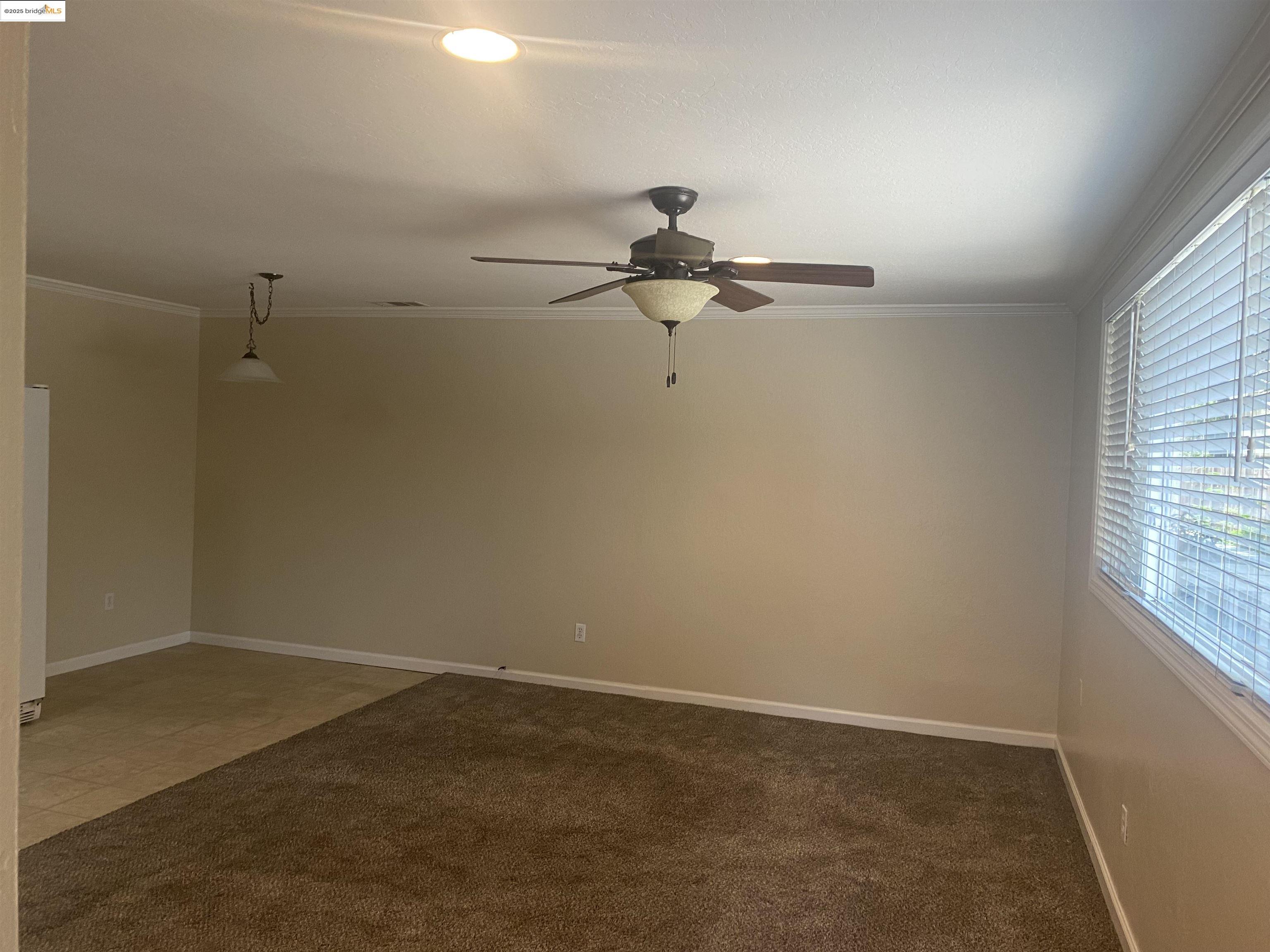 1887 Farm Bureau Road, Unit B Concord, CA 94519 - Photo 5 of 8 a view of a room with racks on the wall