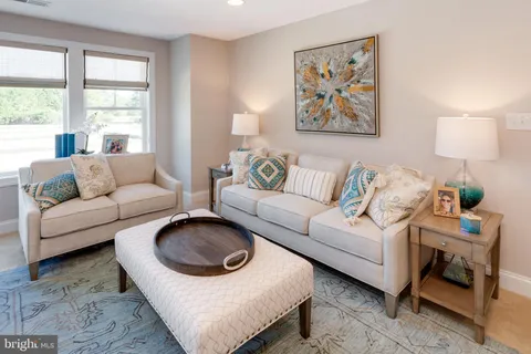 a living room with furniture and a couch