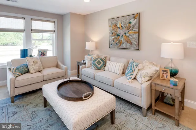 a living room with furniture and a couch