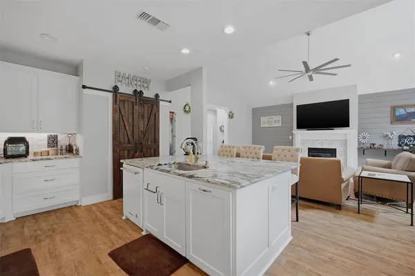 a view of living room with furniture and flat screen tv