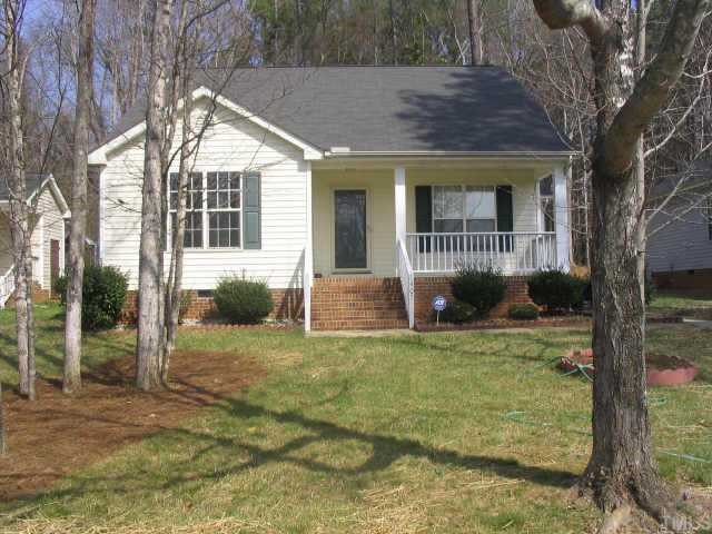 1407 Lenoir Street Raleigh, NC 27610 - Photo 4 of 5 a view of a house with backyard and garden