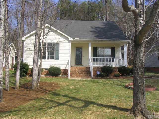 1407 Lenoir Street Raleigh, NC 27610 - Photo 5 of 5 a view of a house with backyard and sitting area