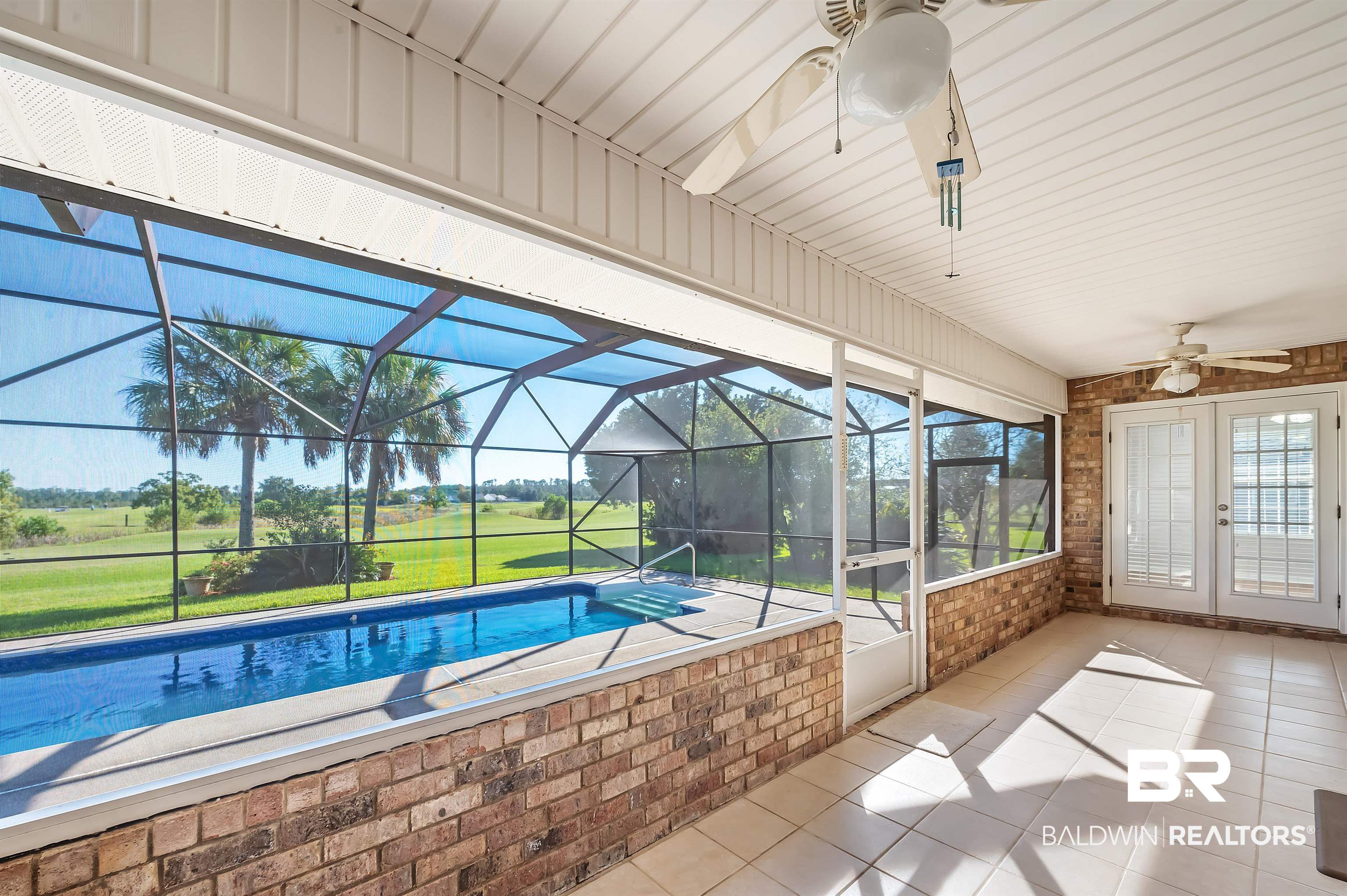 421 Collinwood Loop Foley, AL 36535 - Photo 12 of 62 View of swimming pool with a lanai, a yard, a patio, and ceiling fan