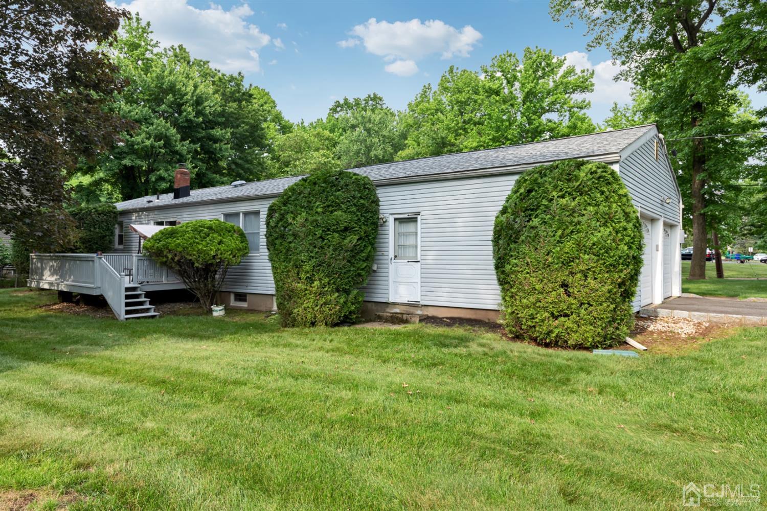 1 Greenwich Road Edison, NJ 08820 - Photo 5 of 26 a view of a backyard with plants and a garden