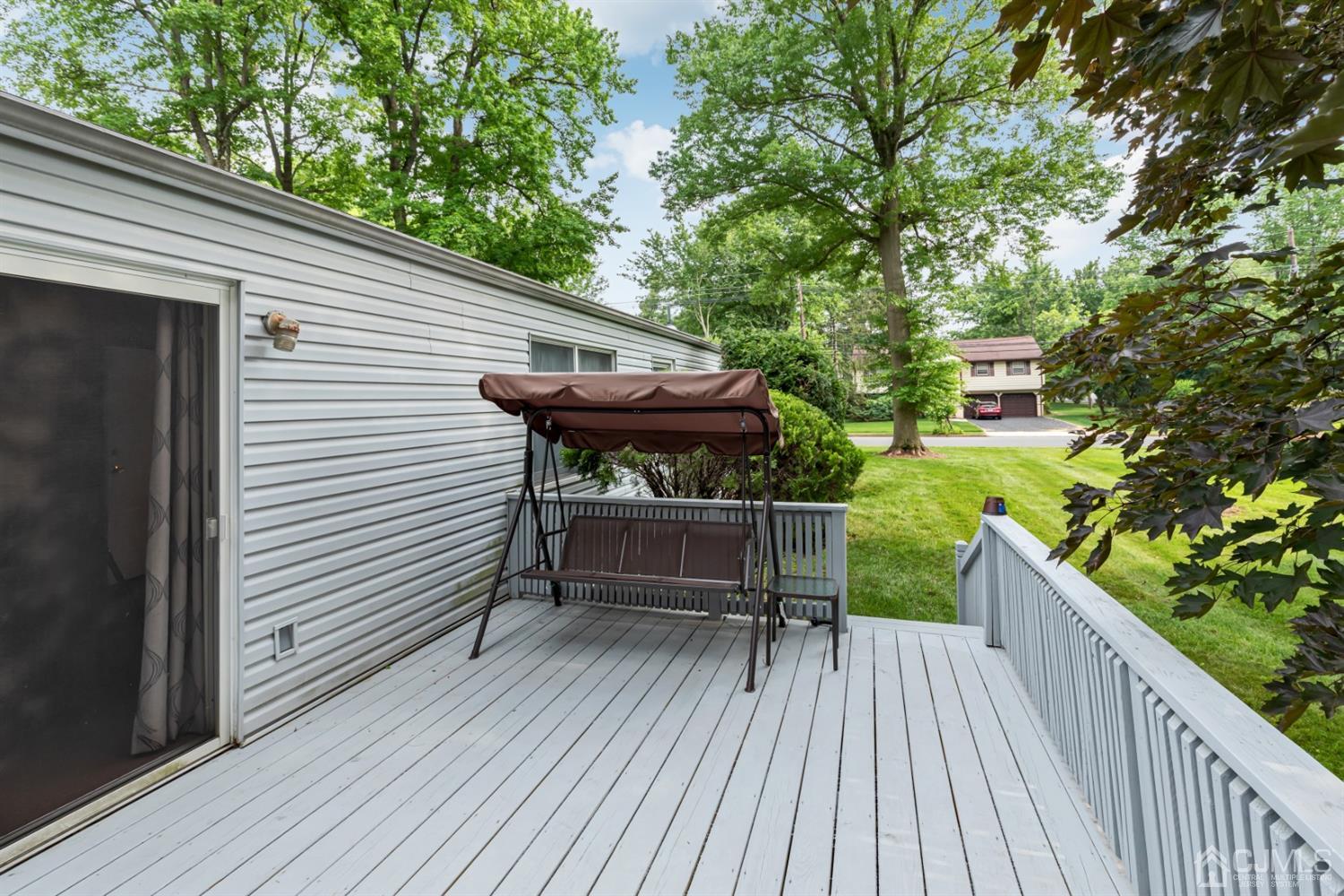 1 Greenwich Road Edison, NJ 08820 - Photo 7 of 26 a view of house with a deck and furniture