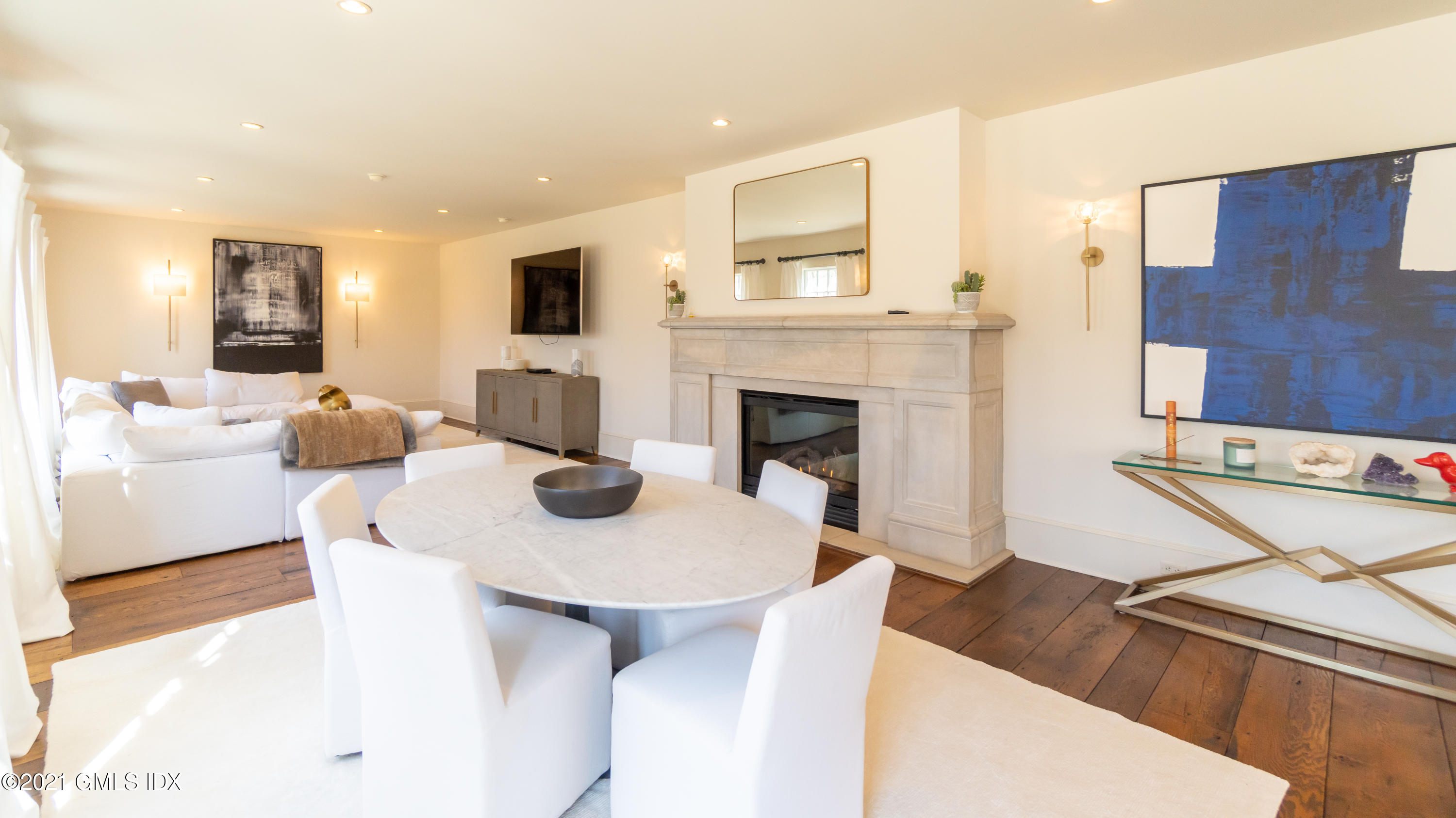 28 Dairy Road Greenwich, CT 06830 - Photo 13 of 23 a living room with furniture a flat screen tv and a fireplace