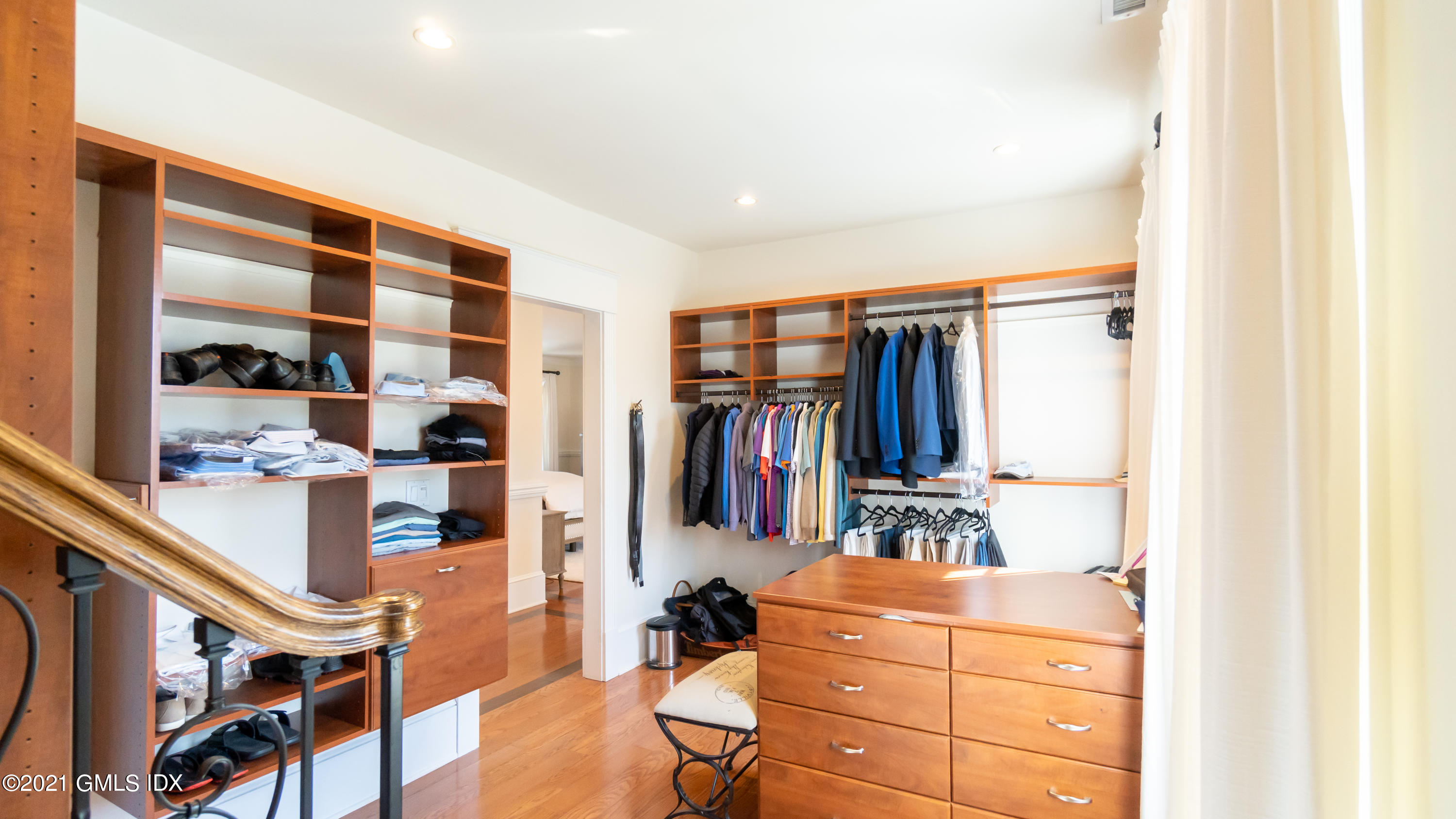 28 Dairy Road Greenwich, CT 06830 - Photo 16 of 23 a view of walk in closet with clothes and shoes