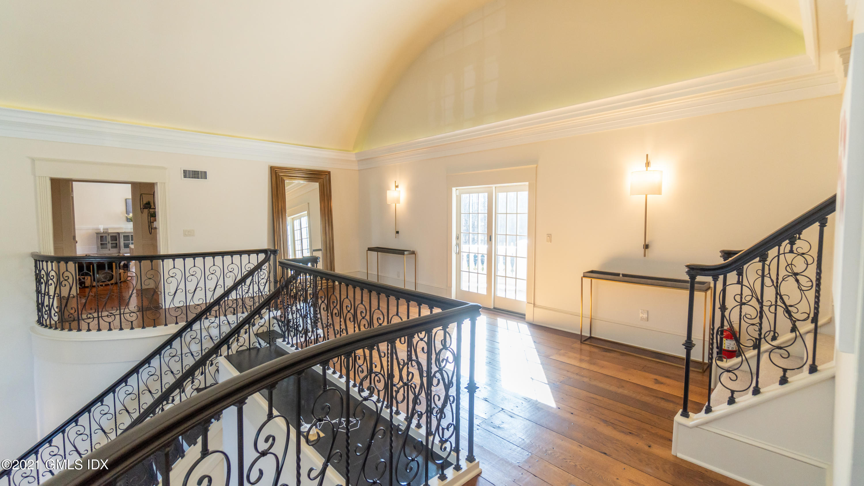 28 Dairy Road Greenwich, CT 06830 - Photo 19 of 23 a view of an entryway wooden floor and dining room