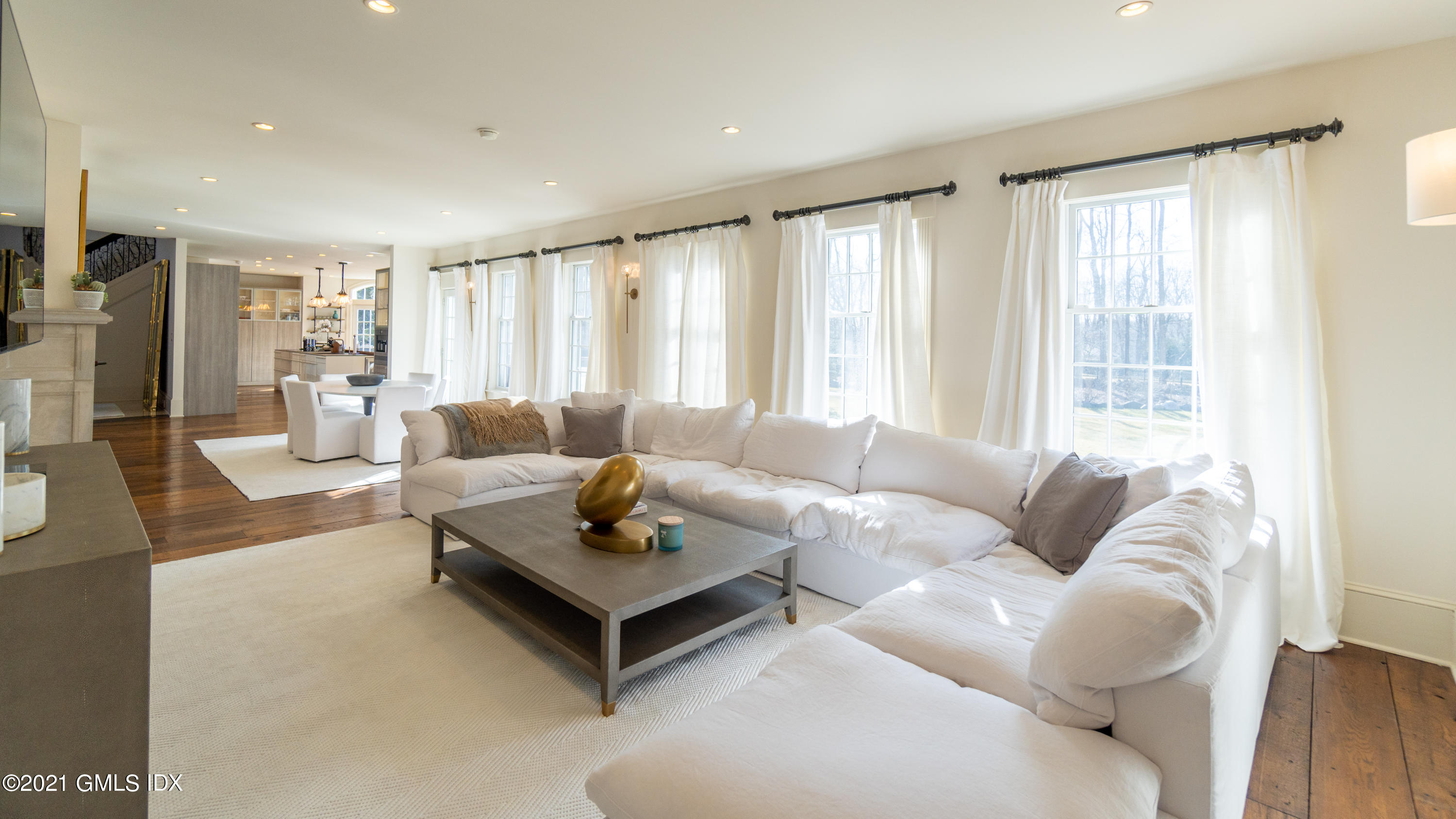 28 Dairy Road Greenwich, CT 06830 - Photo 4 of 23 a living room with furniture and a large window