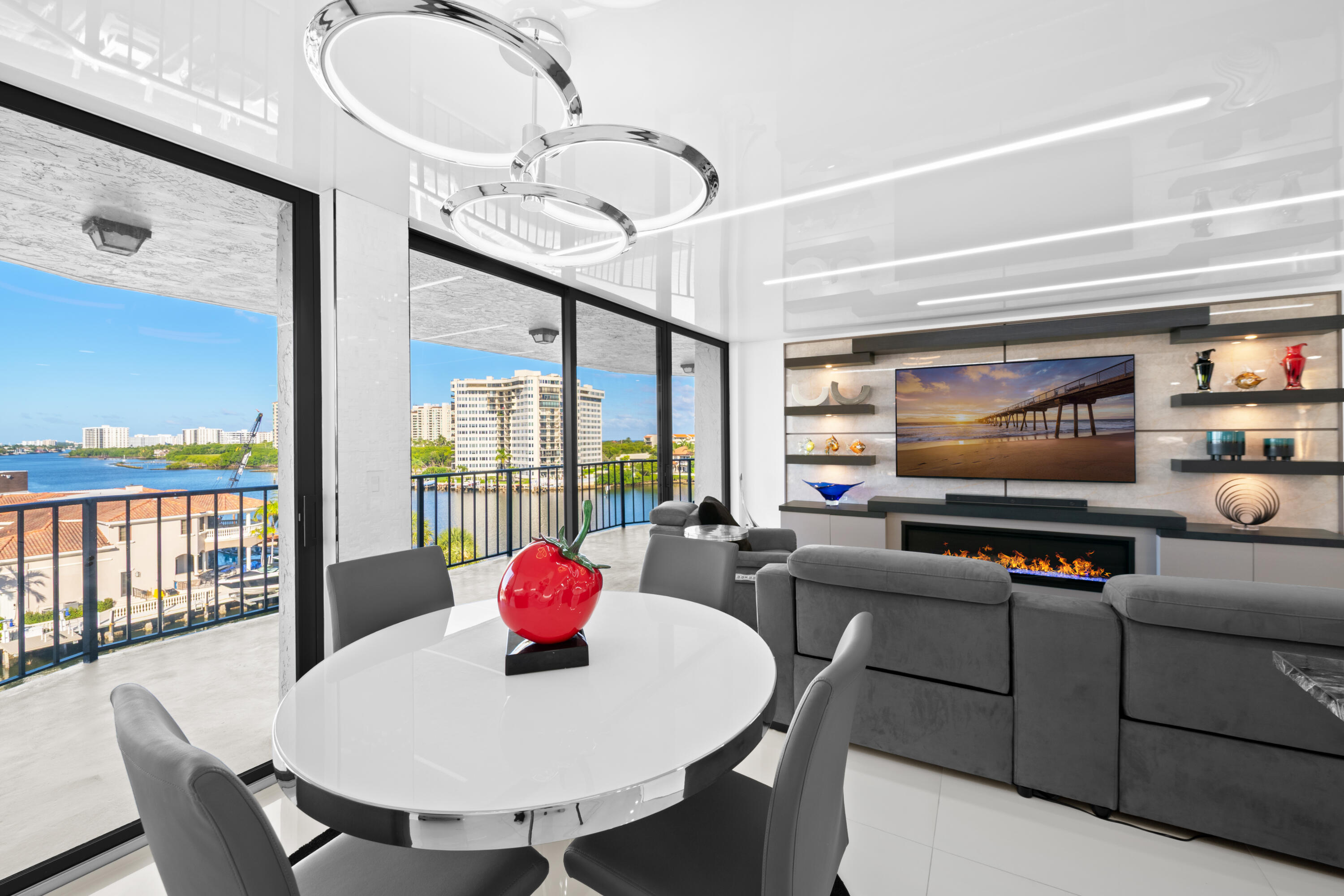 899 Jeffery Street, Unit 612 Boca Raton, FL 33487 - Photo 11 of 63 a living room with furniture and a floor to ceiling window