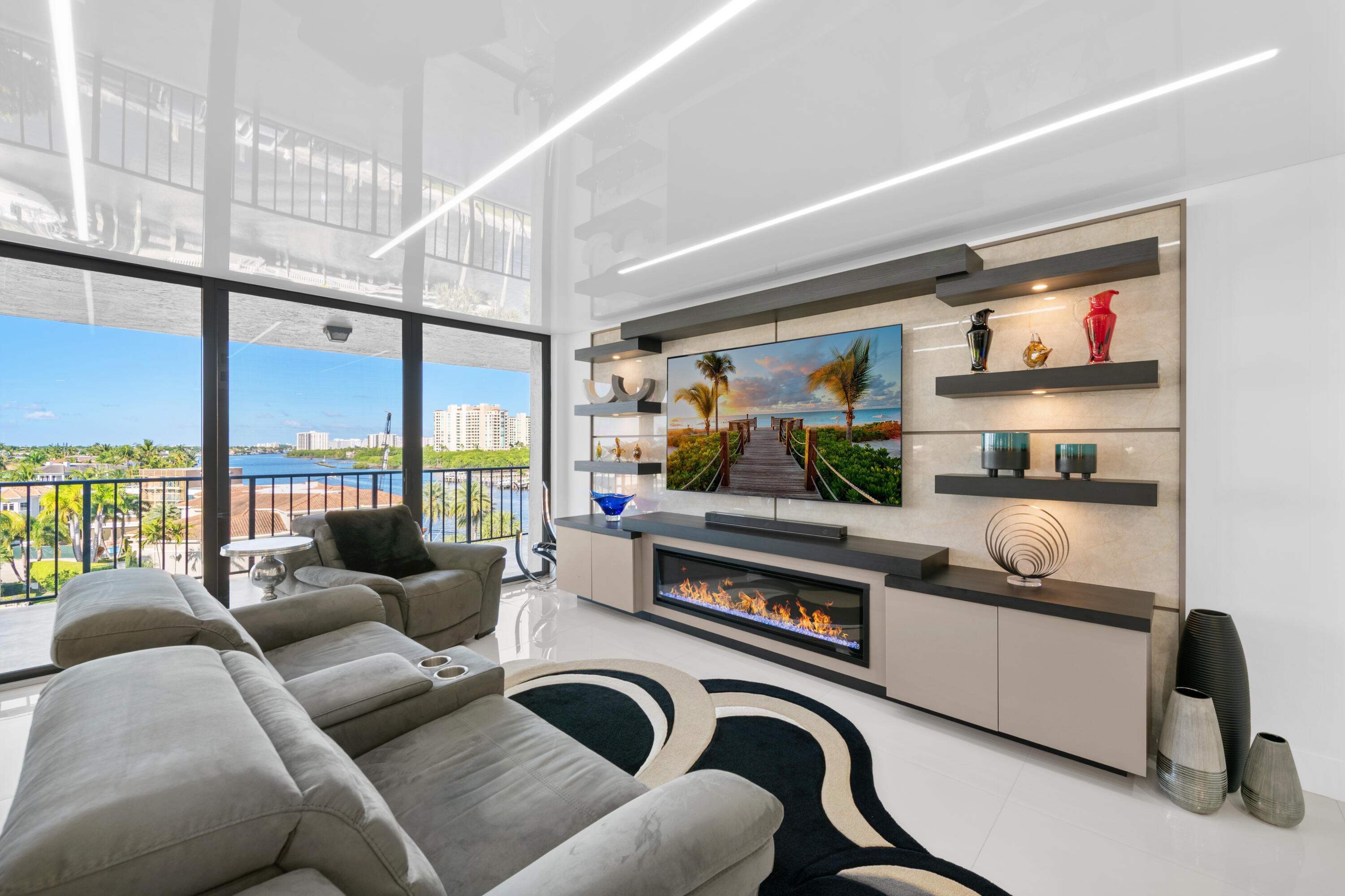 899 Jeffery Street, Unit 612 Boca Raton, FL 33487 - Photo 14 of 63 a living room with furniture and a floor to ceiling window