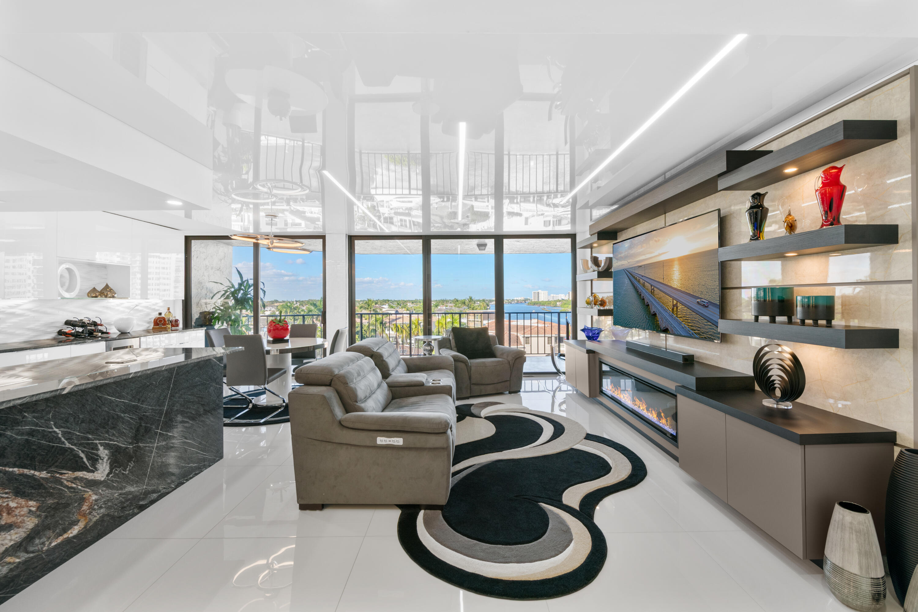 899 Jeffery Street, Unit 612 Boca Raton, FL 33487 - Photo 15 of 63 a living room with furniture and a large window