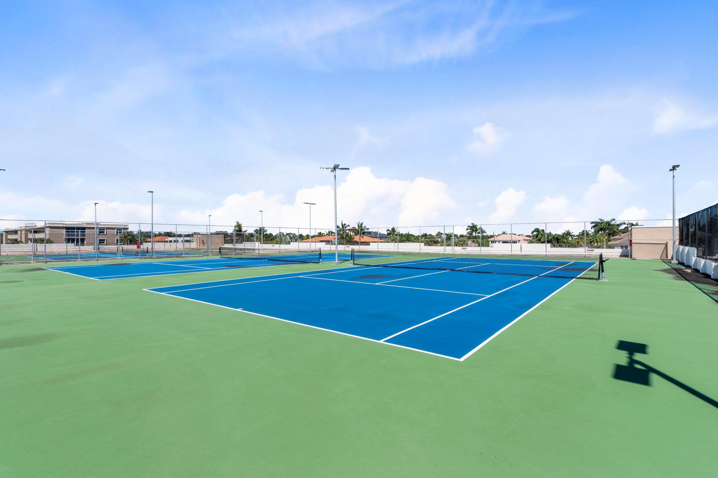 899 Jeffery Street, Unit 612 Boca Raton, FL 33487 - Photo 52 of 63 a view of a tennis court