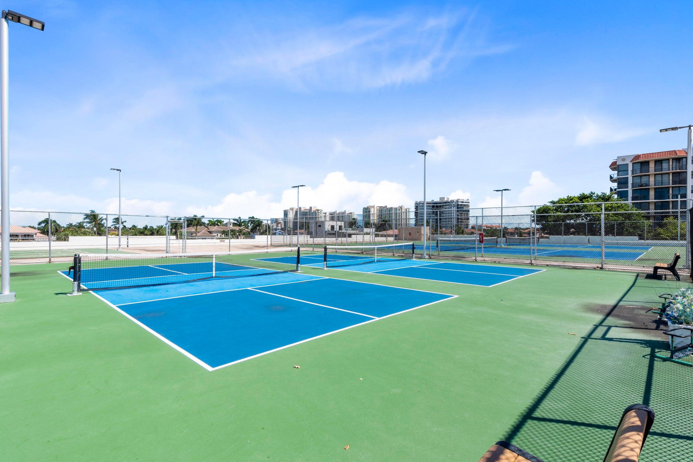 899 Jeffery Street, Unit 612 Boca Raton, FL 33487 - Photo 53 of 63 a view of outdoor space and tennis court