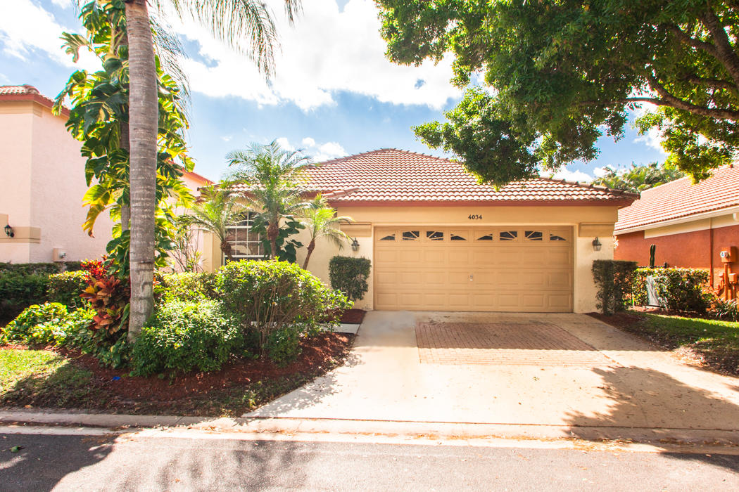 4034 Dorado Drive Riviera Beach, FL 33418 - Photo 1 of 12 Front
