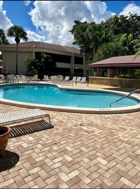 7472 La Paz Boulevard, Unit 103 Boca Raton, FL 33433 - Photo 18 of 21 Pool