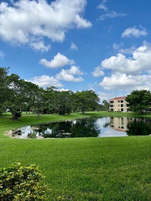 7472 La Paz Boulevard, Unit 103 Boca Raton, FL 33433 - Photo 2 of 21 Lake at the back