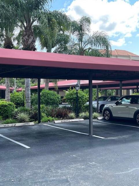 7472 La Paz Boulevard, Unit 103 Boca Raton, FL 33433 - Photo 4 of 21 Carport