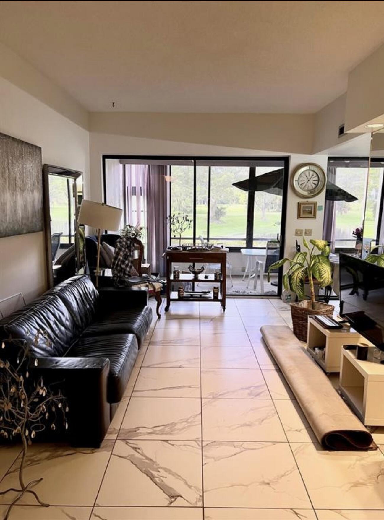 7472 La Paz Boulevard, Unit 103 Boca Raton, FL 33433 - Photo 6 of 21 Living