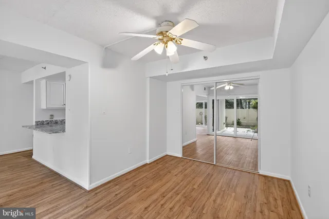 a view of a livingroom with wooden floor