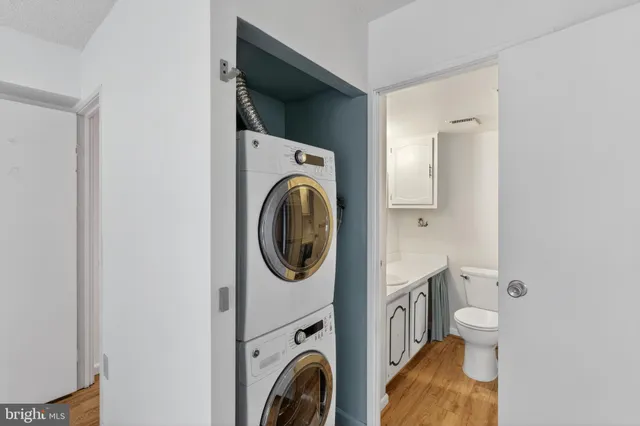 a bathroom with a sink toilet and vanity