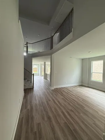 a view of entryway with wooden floor