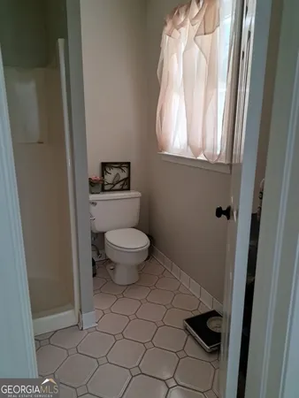 a bathroom with a toilet