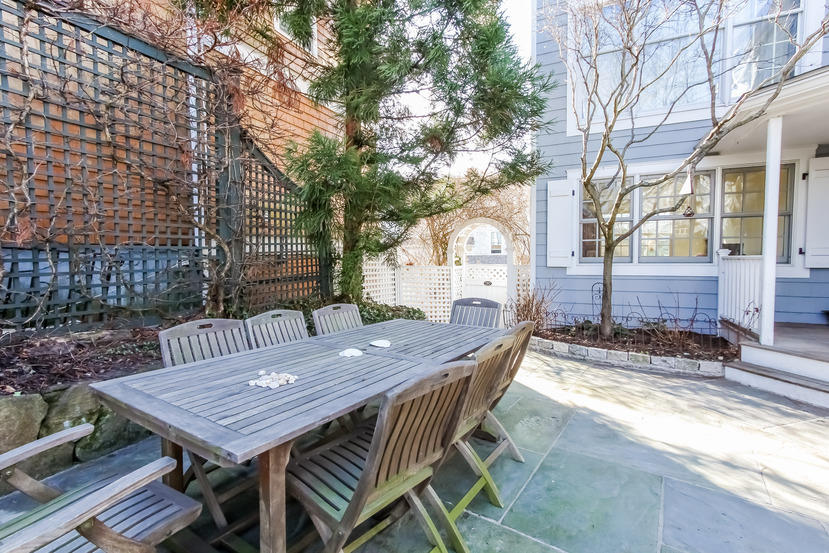 4 Rocky Point Road Rowayton, CT 06853 - Photo 17 of 20 a view of a patio with table and chairs