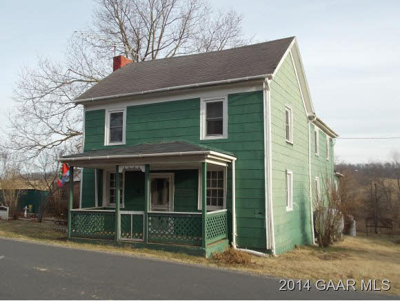 3620 Middlebrook Village Road Middlebrook, VA 24459 - Photo 2 of 18 a view of a white house with large windows and a small yard