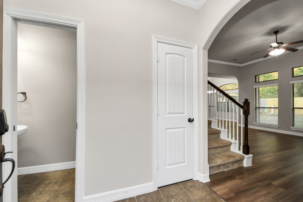 25122 Alina Lane Spring, TX 77386 - Photo 2 of 27 a view of a hallway with wooden floor and entryway