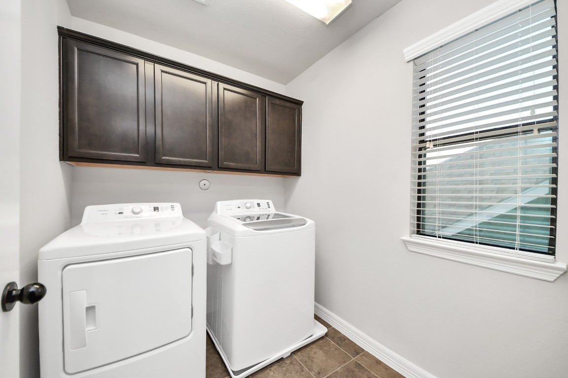 25122 Alina Lane Spring, TX 77386 - Photo 23 of 27 a utility room with dryer and washer
