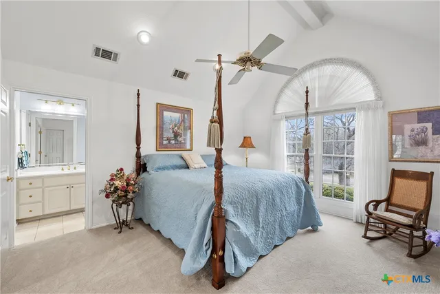 a view of a deck with table and chairs with wooden floor and fence