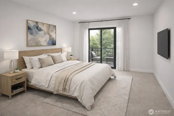 a spacious bedroom with a bed and a flat screen tv