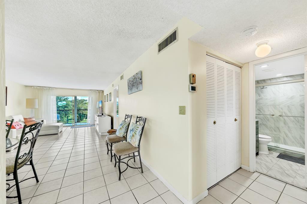 6200 Northwest 44th Street, Unit 405 Lauderhill, FL 33319 - Photo 11 of 44 a view of a livingroom with furniture and window