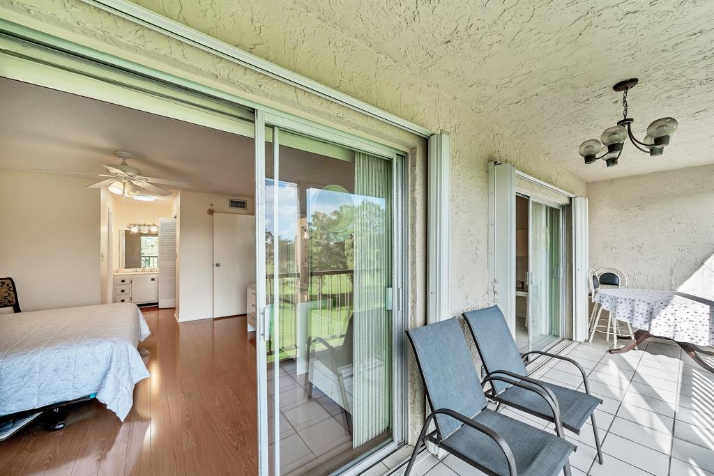 6200 Northwest 44th Street, Unit 405 Lauderhill, FL 33319 - Photo 26 of 44 a view of a bedroom with furniture and windows