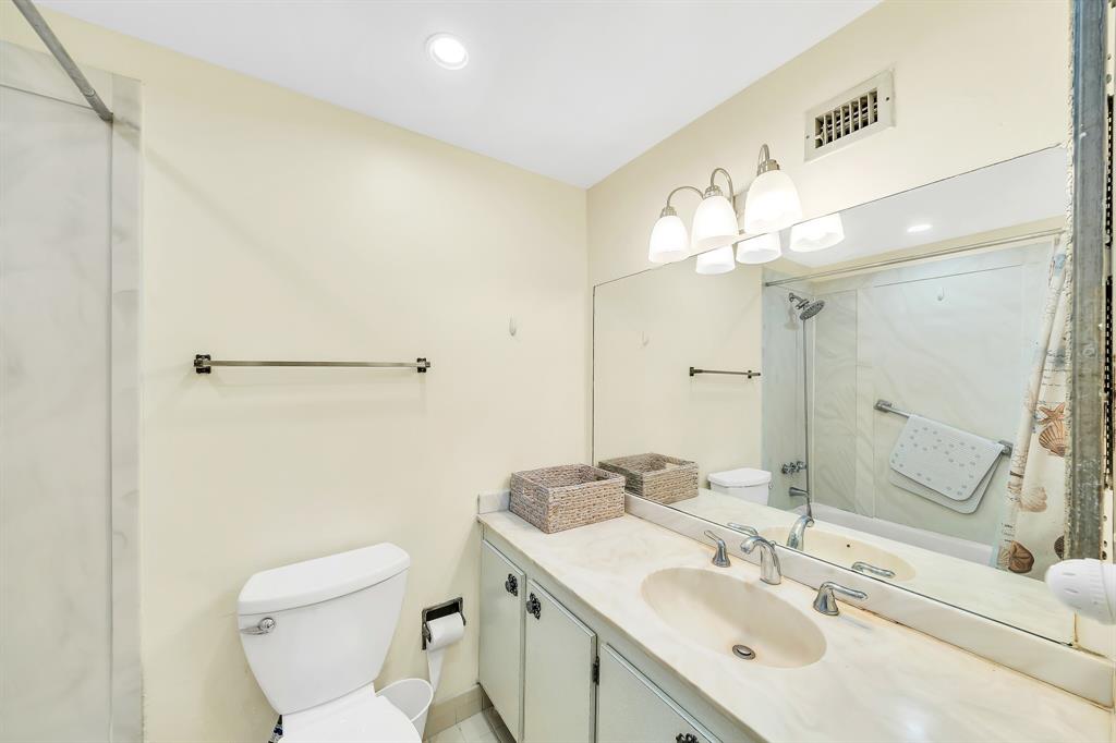 6200 Northwest 44th Street, Unit 405 Lauderhill, FL 33319 - Photo 30 of 44 a bathroom with a sink toilet and shower