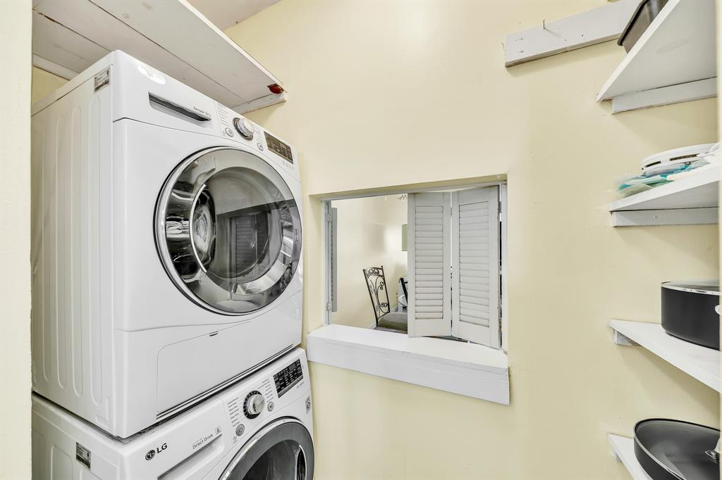 6200 Northwest 44th Street, Unit 405 Lauderhill, FL 33319 - Photo 7 of 44 a utility room with dryer and washer