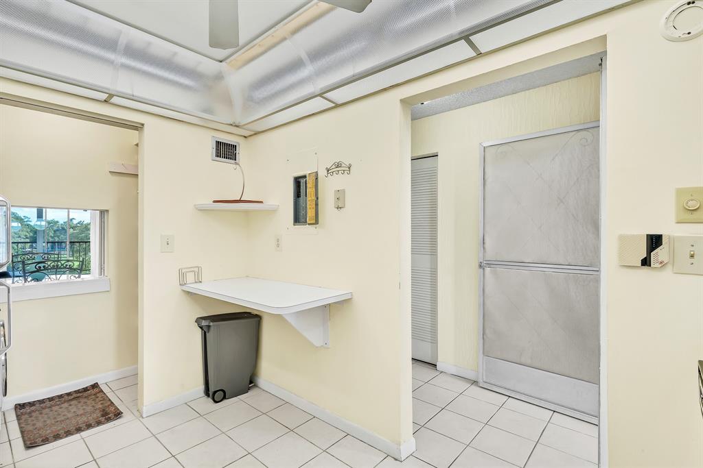 6200 Northwest 44th Street, Unit 405 Lauderhill, FL 33319 - Photo 10 of 44 a bathroom with a sink and mirror