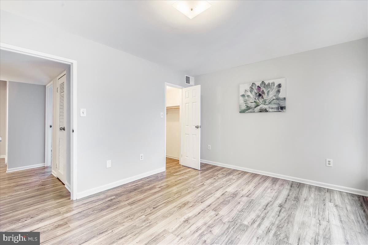17801 Buehler Road, Unit 2E6 Olney, MD 20832 - Photo 20 of 34 Master Bedroom w Walk-In Closet
